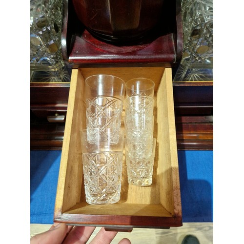 439 - An early 20th century mahogany smoker's cabinet/decanter box, labelled Waring & Gillow, assorted con... 