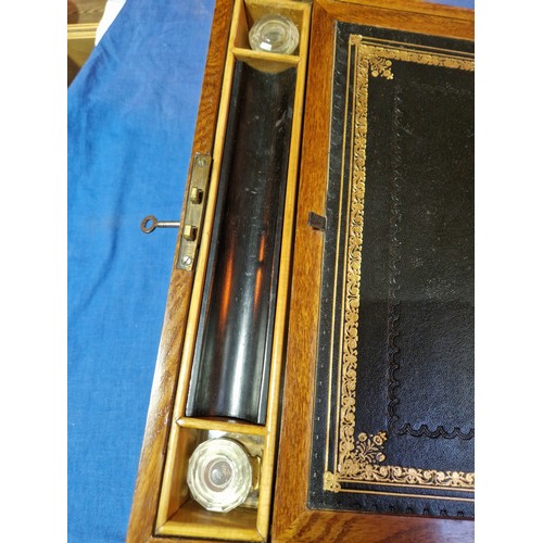 441 - A burr walnut writing slope, length 38.5cm.