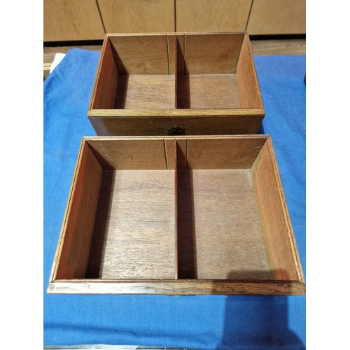 447 - A 19th century oak cabinet with two drawers and campaign style handles.