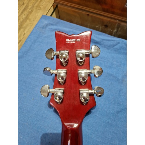 242 - A Daisey Rock Elite electric guitar.