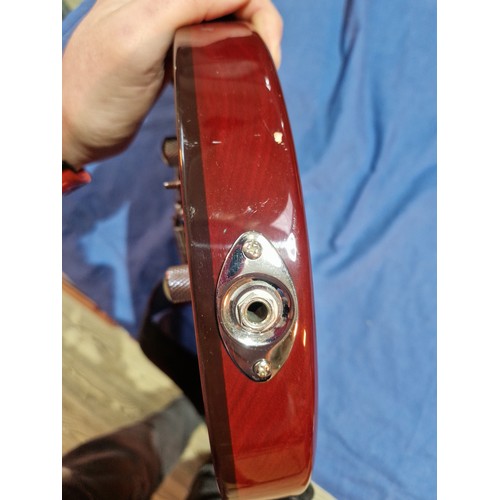 242 - A Daisey Rock Elite electric guitar.