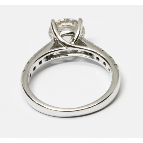 171 - A diamond solitaire ring, the principal four claw set round brilliant cut stone weighing approx. 1.5... 