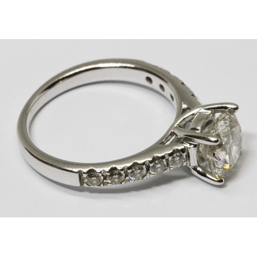 171 - A diamond solitaire ring, the principal four claw set round brilliant cut stone weighing approx. 1.5... 