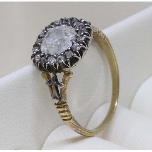 2 - A Georgian diamond cluster ring, the central stone weighing approx. 1ct, surrounded by sixteen melee... 