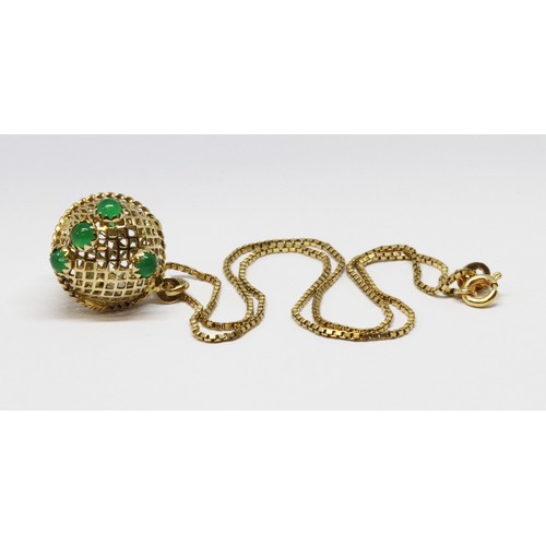 36 - An open work spherical pendant set with green cabochons, marked '585', length (including bale) 25mm,... 