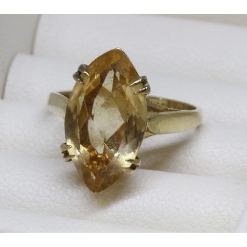 32 - A hallmarked 9ct gold ring set with a marquise cut citrine, gross weight 3.2g, size J/K.