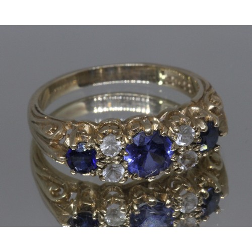 31 - A hallmarked 9ct gold ring set with blue and white stones, gross weight 3.6g, size Q.