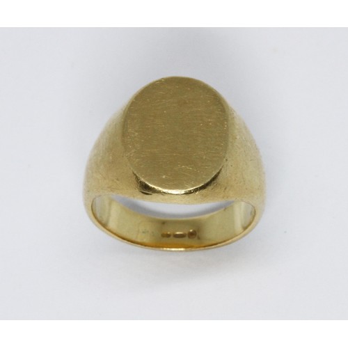 53 - An 18ct gold signet ring, sponsor 'DOM', weight 9.8g, size I/J.