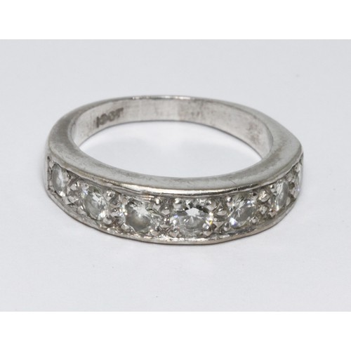 56 - A seven stone diamond ring, total approx. diamond weight 0.80cts, white metal band marked '18ct', gr... 