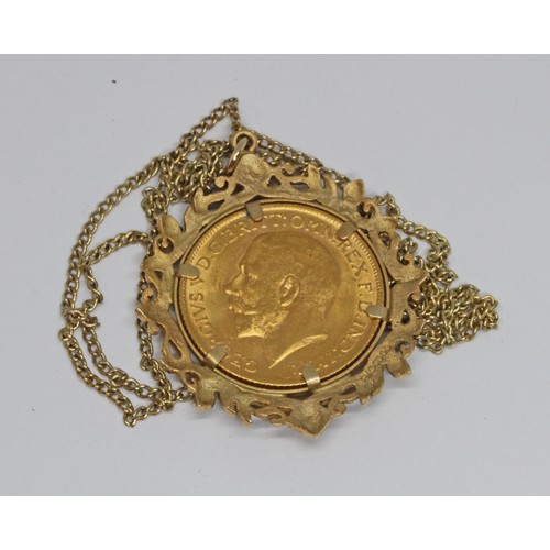 71 - A George V 1911 sovereign, hallmarked 9ct gold pendant mount and chain marked '9c', gross weight 14.... 