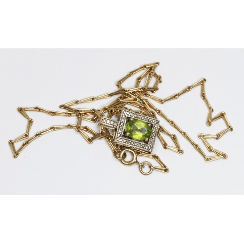 73 - A hallmarked 9ct gold peridot pendant and chain, length 54cm, gross weight 7.1g.