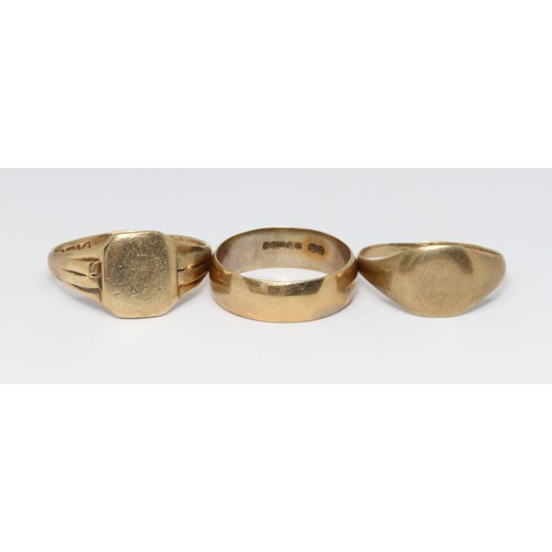 91 - Two hallmarked 9ct gold rings and another unmarked,, gross weight 9.6g.