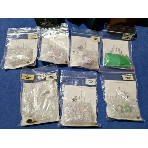 574 - A box of assorted Hantel Victorian Miniatures models, together with a stand and bound volumes of The... 