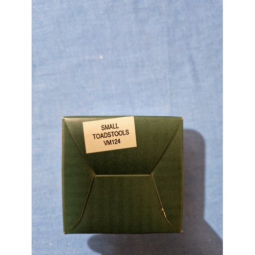 574 - A box of assorted Hantel Victorian Miniatures models, together with a stand and bound volumes of The... 