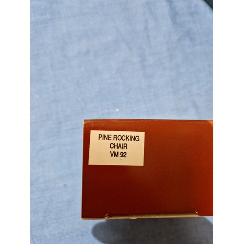 574 - A box of assorted Hantel Victorian Miniatures models, together with a stand and bound volumes of The... 