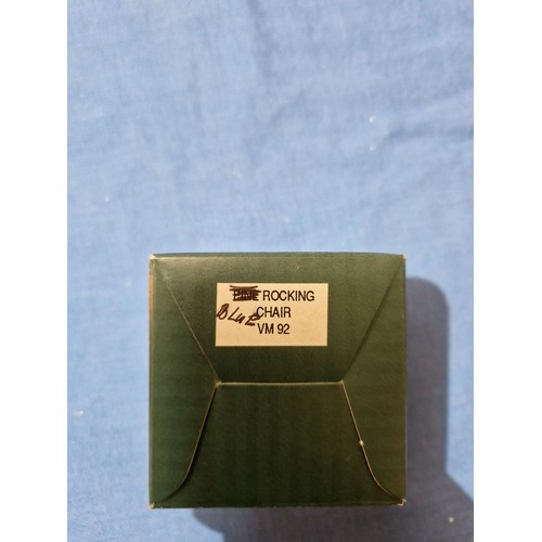 574 - A box of assorted Hantel Victorian Miniatures models, together with a stand and bound volumes of The... 