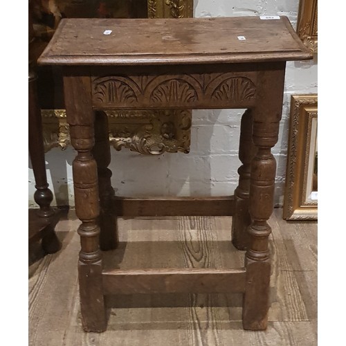 882 - A 17th century and later oak joint stool.