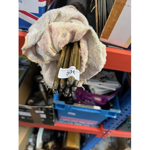 306 - A bundle of brass stair rods