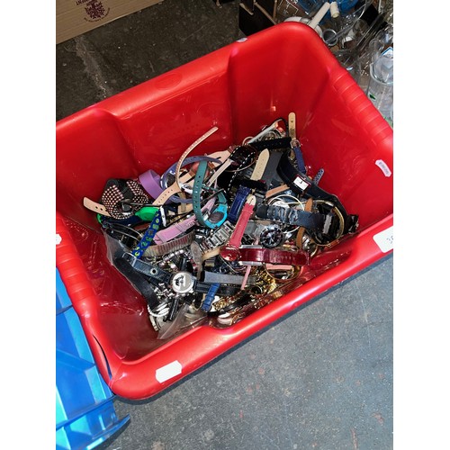 369 - A tub of watches and parts