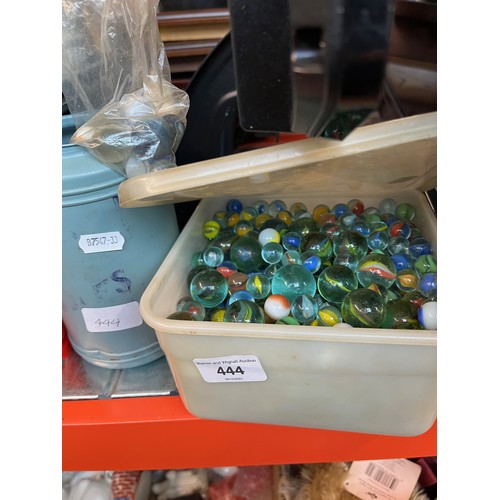 444 - Two tubs of glass marbles.