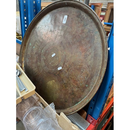 380 - An Eastern brass charger, 57.5cm diameter together with a light up picture