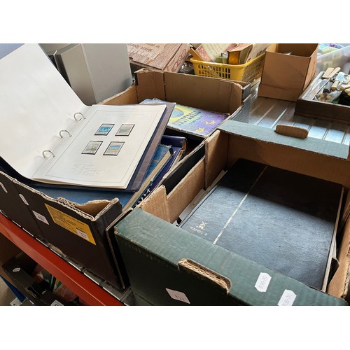 422 - 2 boxes of stamp albums