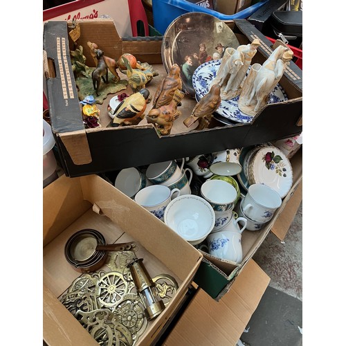 478 - Four boxes of mixed items including brass, ornaments, tea wares. Includes horse brasses and mini bra... 