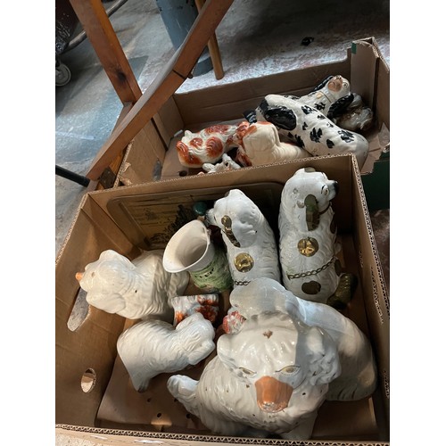 484 - Two boxes of Staffordshire pot dogs