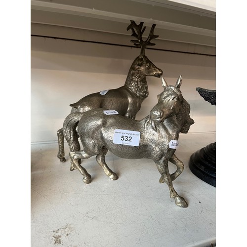 532 - A cast metal stag and a cast metal horse.