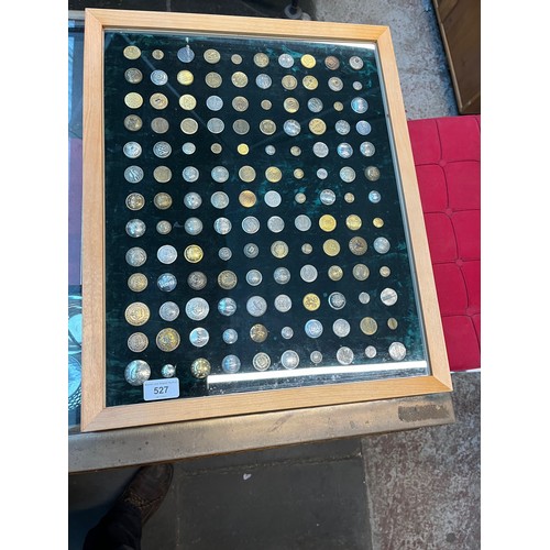 527 - A display case containing 130 transport uniform buttons, trams, railway, mainly Unite States, also i... 