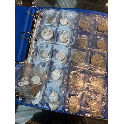 517 - An album of coins and a bag of King Charles III 50 p pieces