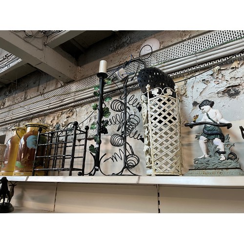 529 - A group of metalware items to include 2 umbrella stands, 2 wine racks, candle stand and 2 decorated ... 