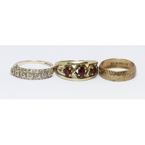 193 - A group of three hallmarked 9ct gold rings, gross weight 7.2g.