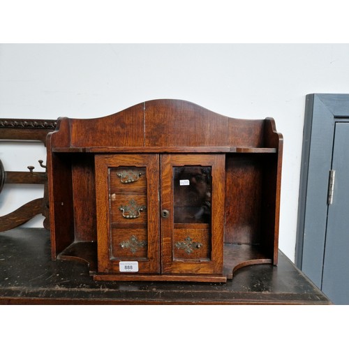 888 - An Edwardian oak smoker's cabinet.