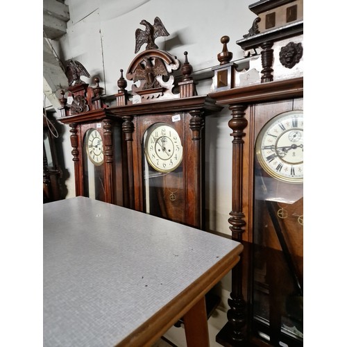 1042 - A Vienna wall clock complete with weights, pendulum and key.