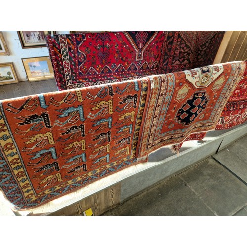 1072 - 2 Middle Eastern carpets; appx 150cm x 107cm and  156cm x 103cm