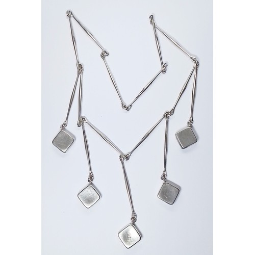 259 - A Georg Jensen silver necklace no. 123, designed by Astrid Fog, post 1945, formed from five silver c... 