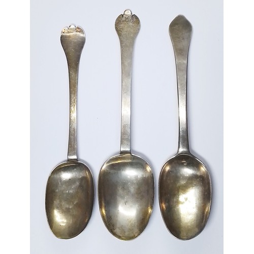 254 - A group of three silver trefid spoons, circa 1700, unascribed, length 18.5cm to 20cm, weight 152g.