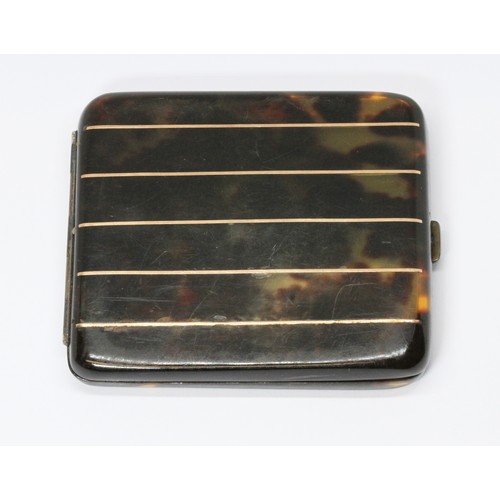 239 - An Art Deco tortoiseshell cigarette case, gold tone inlay to front, interior with hallmarked silver ... 