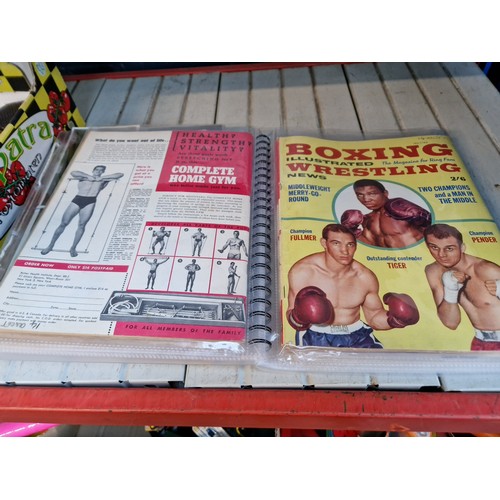 114 - A collection of boxing ephemera including Floyd Patterson photograph, boxing annual 1945, other annu... 