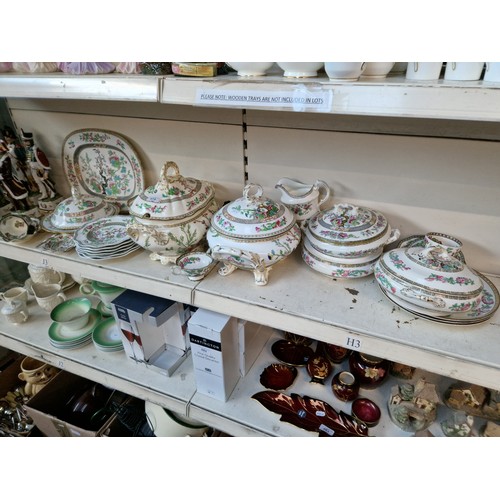 673 - 'Indian Tree' ceramics including lidded tureens, large platter, plates, cups and saucers, jug, sugar... 