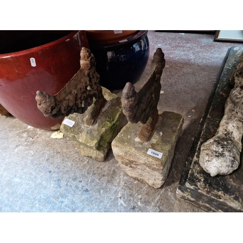 1096 - Two Georgian cast iron and stone boot scrapers.