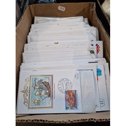 375 - A box of world stamp covers.