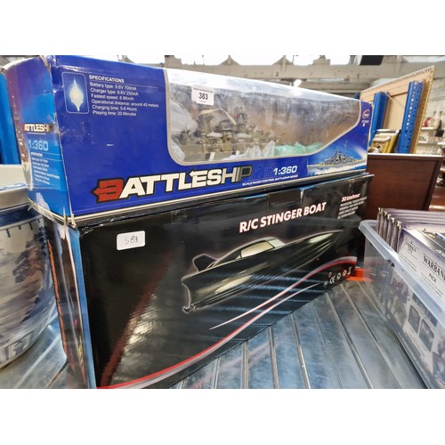 383 - A boxed  R/C stinger boat & a Boxed R/C HT-3827 Battleship 1/360 Scale.