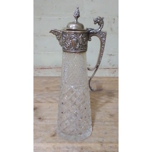 285 - An Elizabeth II silver mounted claret jug, Edward Barnard & Sons Ltd, London 1975, height 30.5cm.