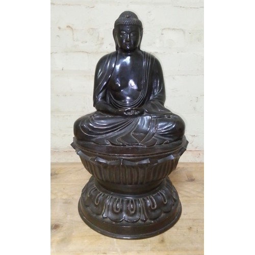 311 - A bronze Buddha, 18th/19th century, round lotus base, Chinese characters to inside foot rim, height ... 