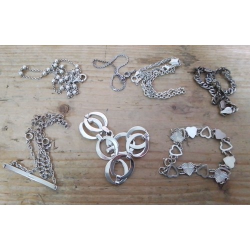 369 - Seven assorted silver bracelets.