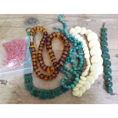 394 - Assorted vintage beaded jewellery comprising aventurine quartz, coral, amber, amazonite and celluloi... 