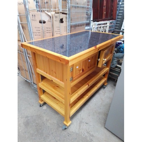 1100B - A wooden kitchen utility unit.