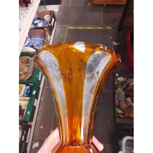 600 - Three Bohemian amber and clear glass vases